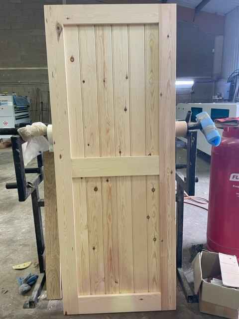 Back of a Frame and Ledge Pine Door